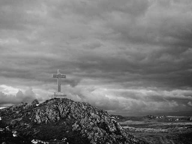 Cross at Ynys Llanddwyn, Anglesey, Wales by Sam Davis - Photographic Print